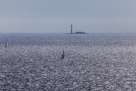 Lone lighthouse on the Mediterranean Sea. Marseille, Provence-Alpes-Cote d'Azur, France.の写真素材