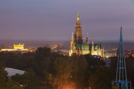 House of Culture and St. Mary's Basilica in Dabrowa Gornicza . Dabrowa Gornicza, Slaskie, Poland.の写真素材