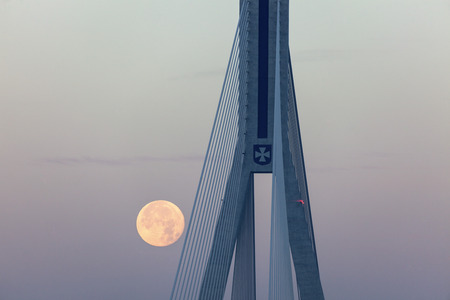 Super moon by Tadeusz Mazowiecki Bridge in Rzeszow. Rzeszow, Podkarpackie, Poland.の写真素材
