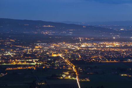 Panorama of Assisi at night. Assisi, Umbria, Italy.の写真素材