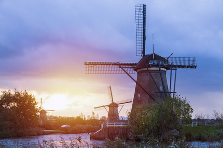 Windmills at Kinderdijk at sunset. Kinderdijk, South Holland, Netherlandsの写真素材