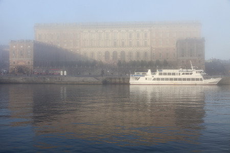 Stockholm Palace in fog. Stockholm, Sodermanland and Uppland, Sweden.のeditorial素材