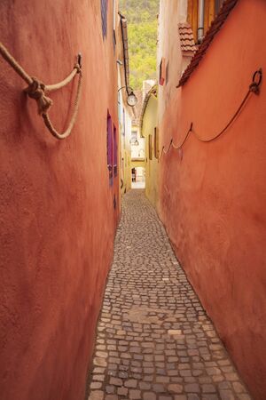 Strada Sforii - the narrowest street in Brasov. Brasov, Brasov County, Romania.の写真素材