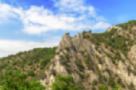 Blurred mountain landscape under the bright blue skyの写真素材