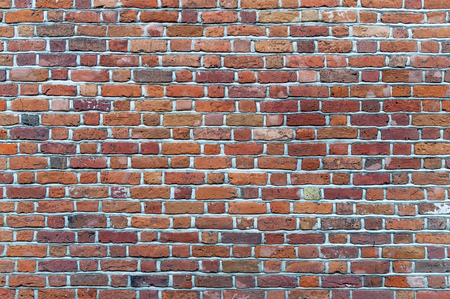 Background of old vintage brick wallの写真素材