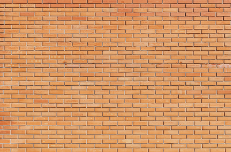 Background of red building brick wallの写真素材
