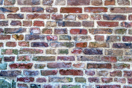 Colorful background of old vintage brick wallの写真素材