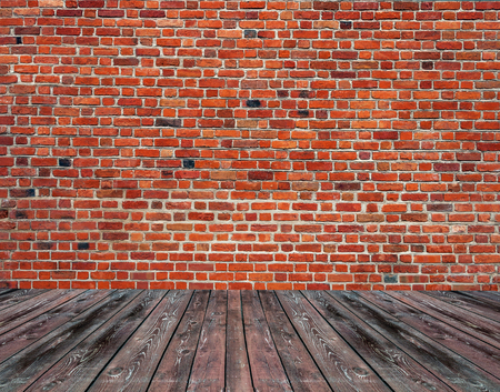 Large background of gray urban brick wall with floorの写真素材