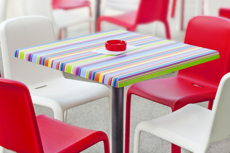 Plastic table and chair in the cafe gardenの写真素材