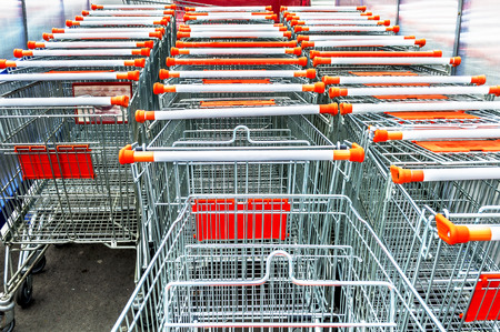A lot of empty shopping carts for shopping in marketの写真素材