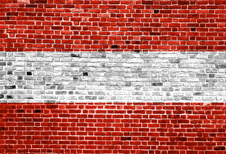 Flag of Austria painted on brick wall, background textureの写真素材