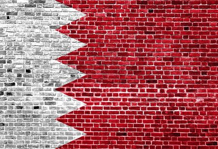 Flag of Bahrain painted on brick wall, background textureの写真素材