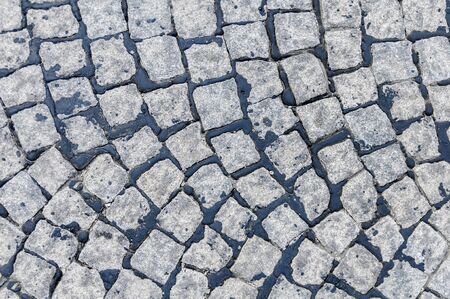 Grey cobblestone pavement backgroundの写真素材