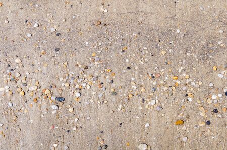 Sandy beach and stone for backgroundの写真素材