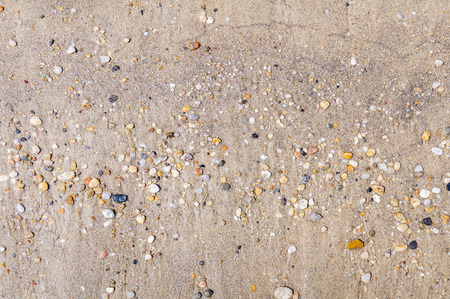 Sandy beach and stone for backgroundの写真素材
