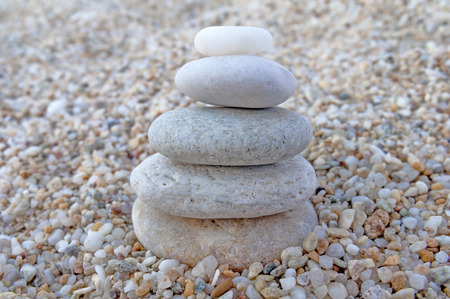 Stack of zen stones on beachの写真素材