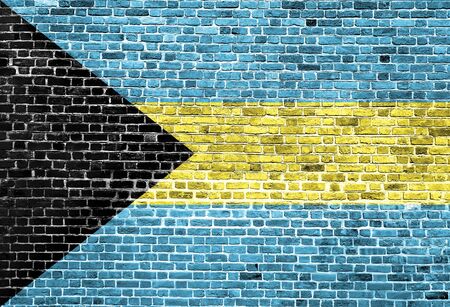 Flag of Bahamas painted on brick wall, background textureの写真素材