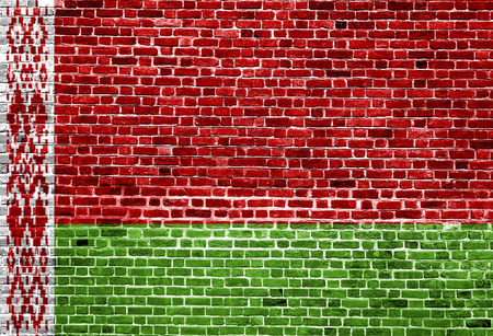 Flag of Belarus painted on brick wall, background textureの写真素材