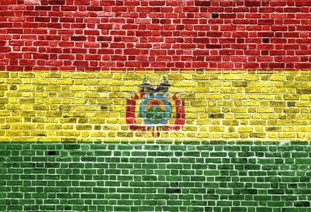 Flag of Bolivia painted on brick wall, background textureの写真素材