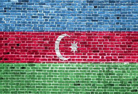 Flag of Azarbeijan painted on brick wall, background textureの写真素材