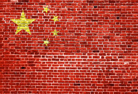 Flag of China painted on brick wall, background textureの写真素材