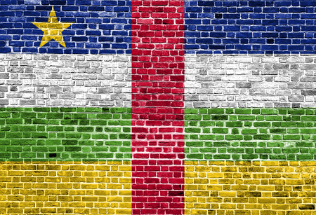 Flag of Central African Republic painted on brick wall, background textureの写真素材