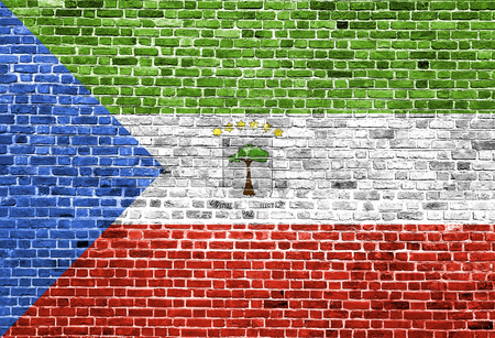 Flag of Equatorial Guinea painted on brick wall, background textureの写真素材