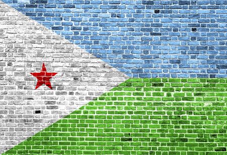 Flag of Djibouti painted on brick wall, background textureの写真素材