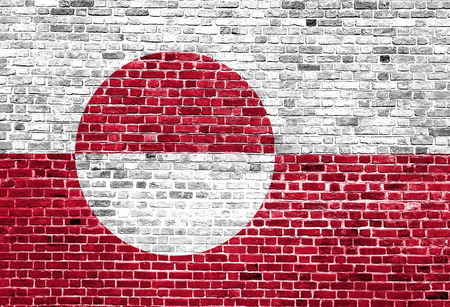 Flag of Greenland painted on brick wall, background textureの写真素材