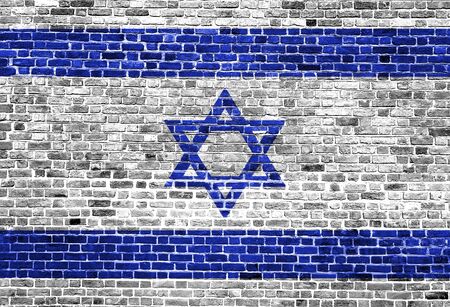 Flag of Israel painted on brick wall, background textureの写真素材