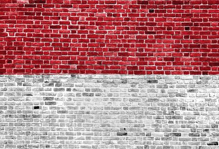 Flag of Indonesia painted on brick wall, background textureの写真素材