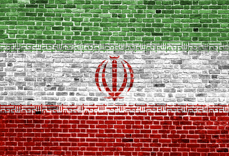 Flag of Iran painted on brick wall, background textureの写真素材