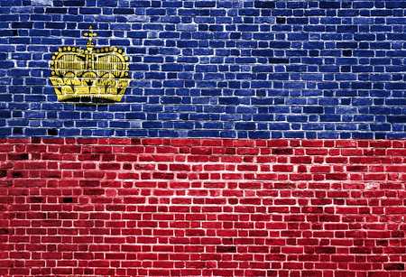 Flag of Liechtenstein painted on brick wall, background textureの写真素材