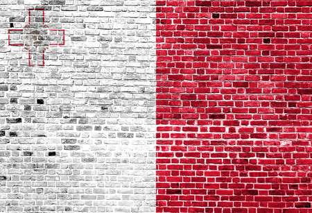 Flag of Malta painted on brick wall, background textureの写真素材
