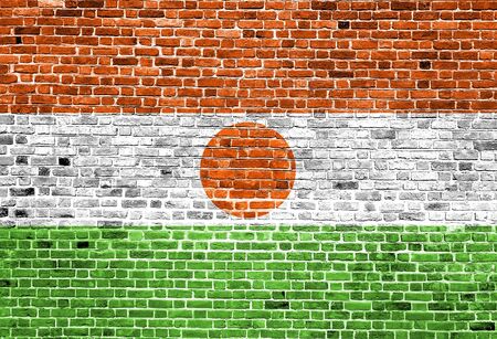 Flag of India painted on brick wall, background textureの写真素材