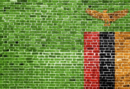 Flag of Zambia painted on brick wall, background textureの写真素材