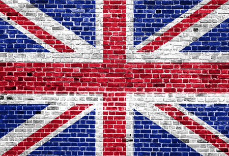 Flag of UK painted on brick wall, background textureの写真素材