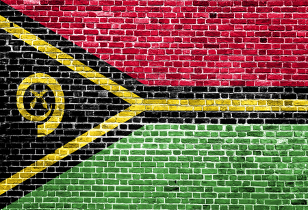 Flag of Vanuatu painted on brick wall, background textureの写真素材