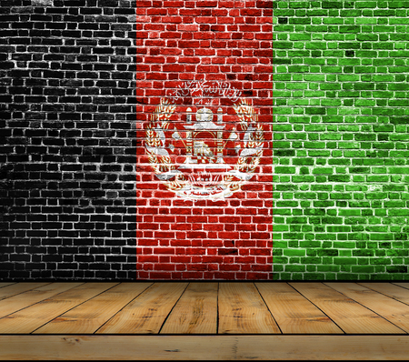 Afganistan flag painted on brick wall with wooden floorの写真素材
