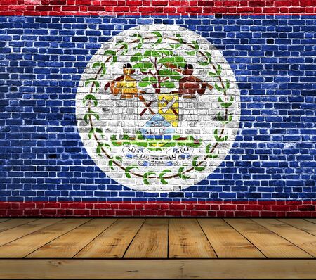 Belize flag painted on brick wall with wooden floorの写真素材