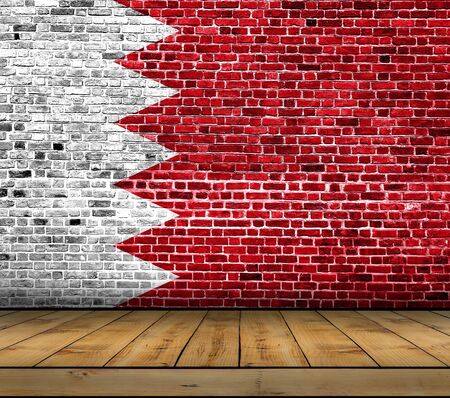 Bahrain flag painted on brick wall with wooden floorの写真素材
