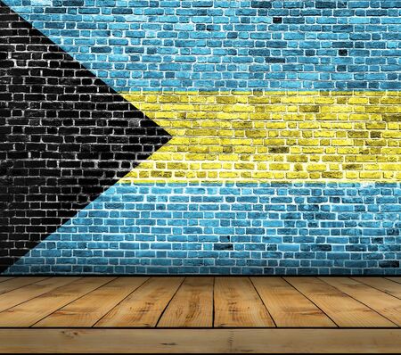 Bahamas flag painted on brick wall with wooden floorの写真素材