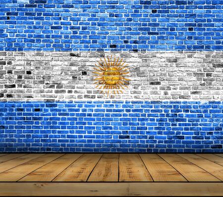 Argentina flag painted on brick wall with wooden floorの写真素材