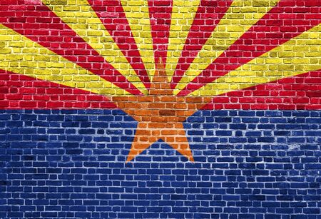 Arizona US flag painted on old vintage brick wallの写真素材