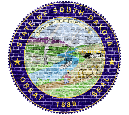 South Dakota Seal US flag painted on old vintage brick wallの写真素材