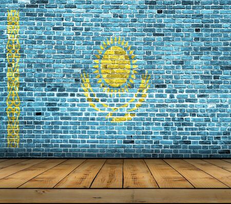 Kazakhstan flag painted on brick wall with wooden floorの写真素材