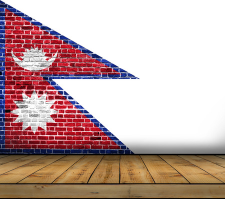 Nepal flag painted on brick wall with wooden floorの写真素材