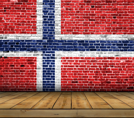 Norway flag painted on brick wall with wooden floorの写真素材