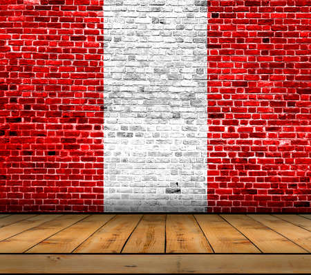 Peru flag painted on brick wall with wooden floorの写真素材