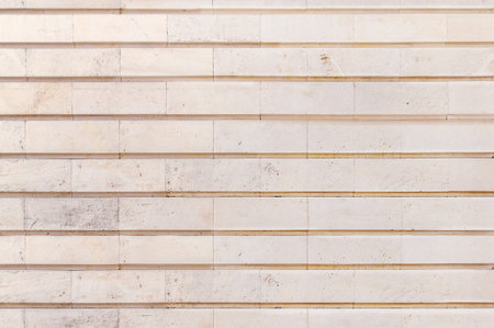 Big light yellow stone building wall texture